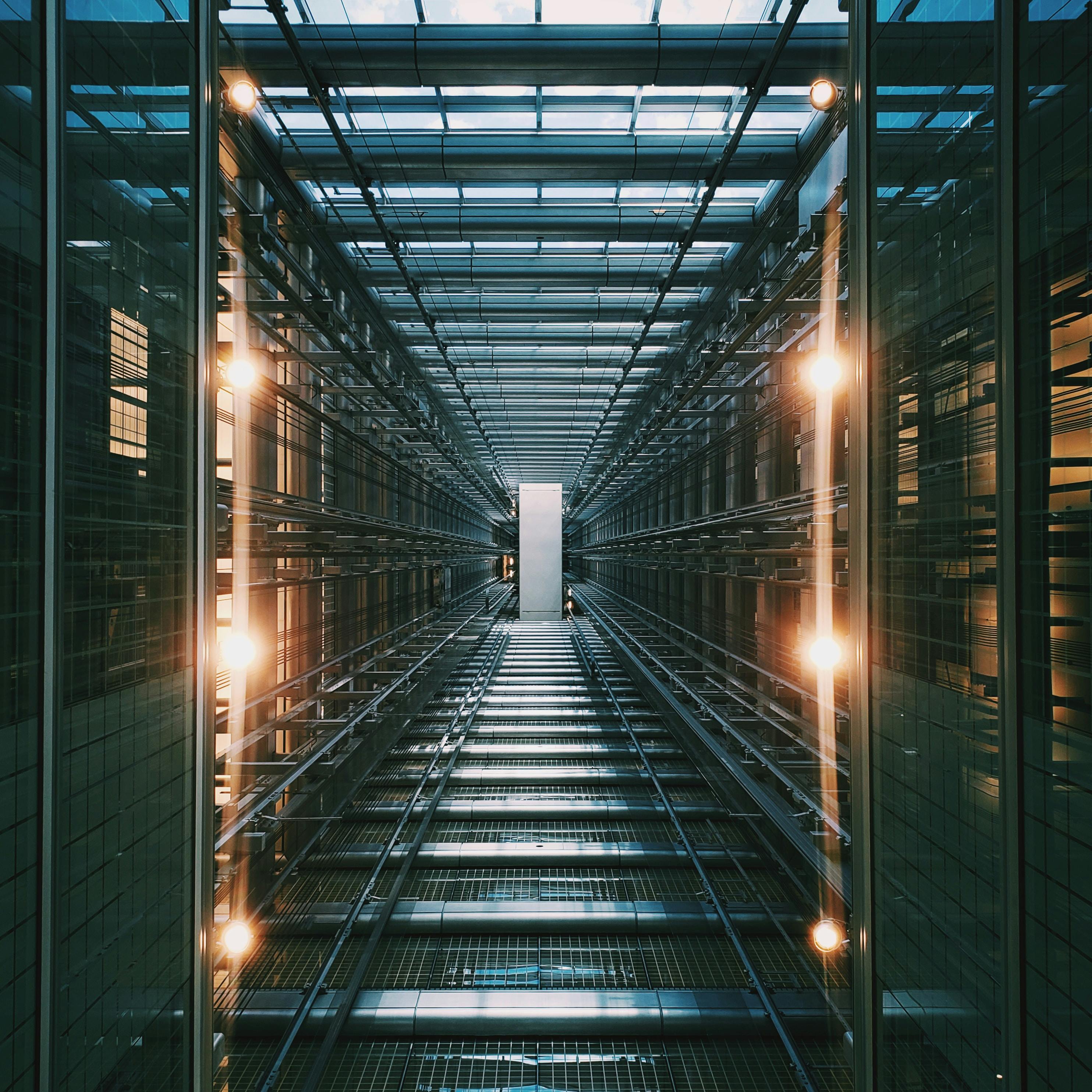 Long hallway of servers at telecommunications data center