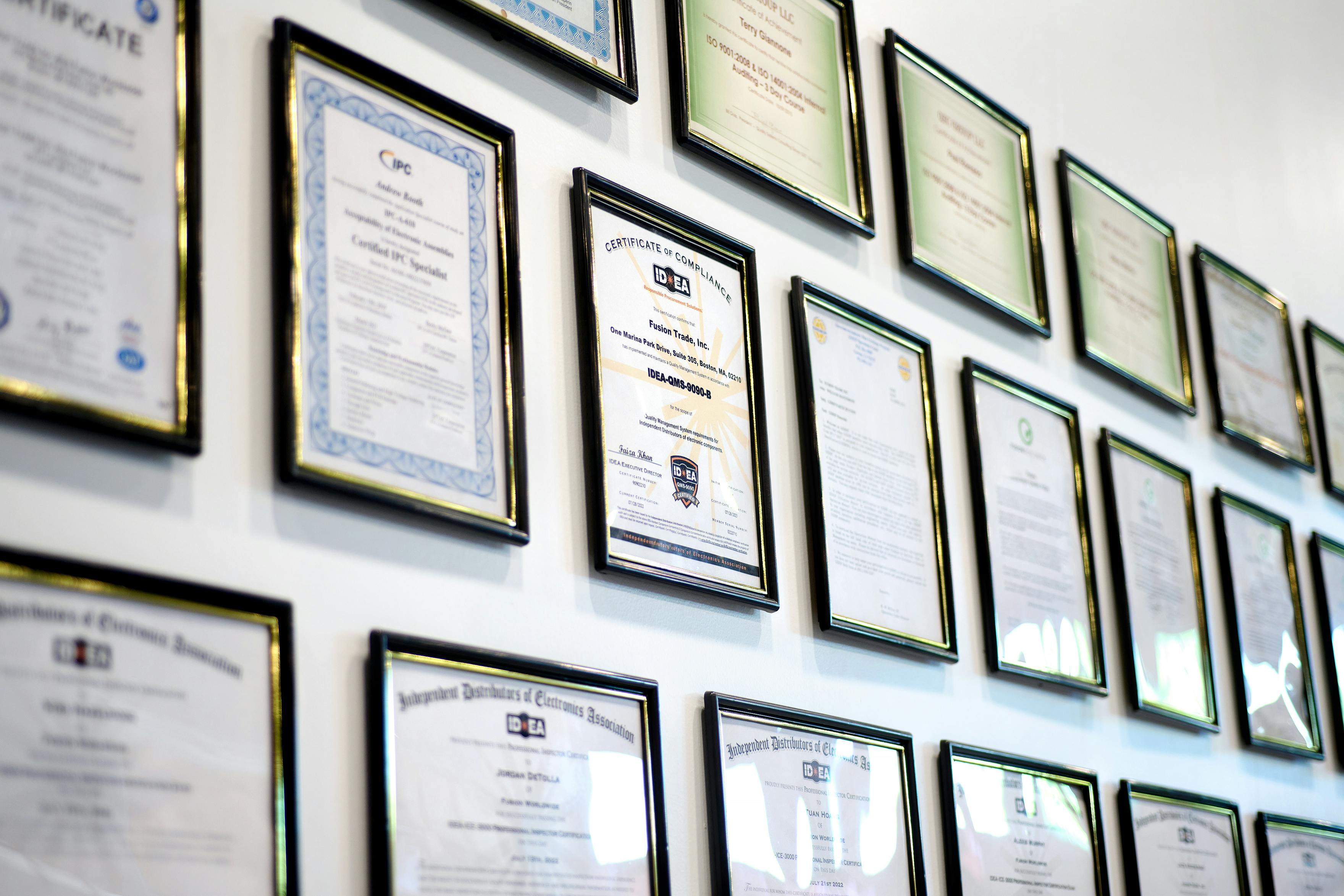 Wall of framed certification documents
