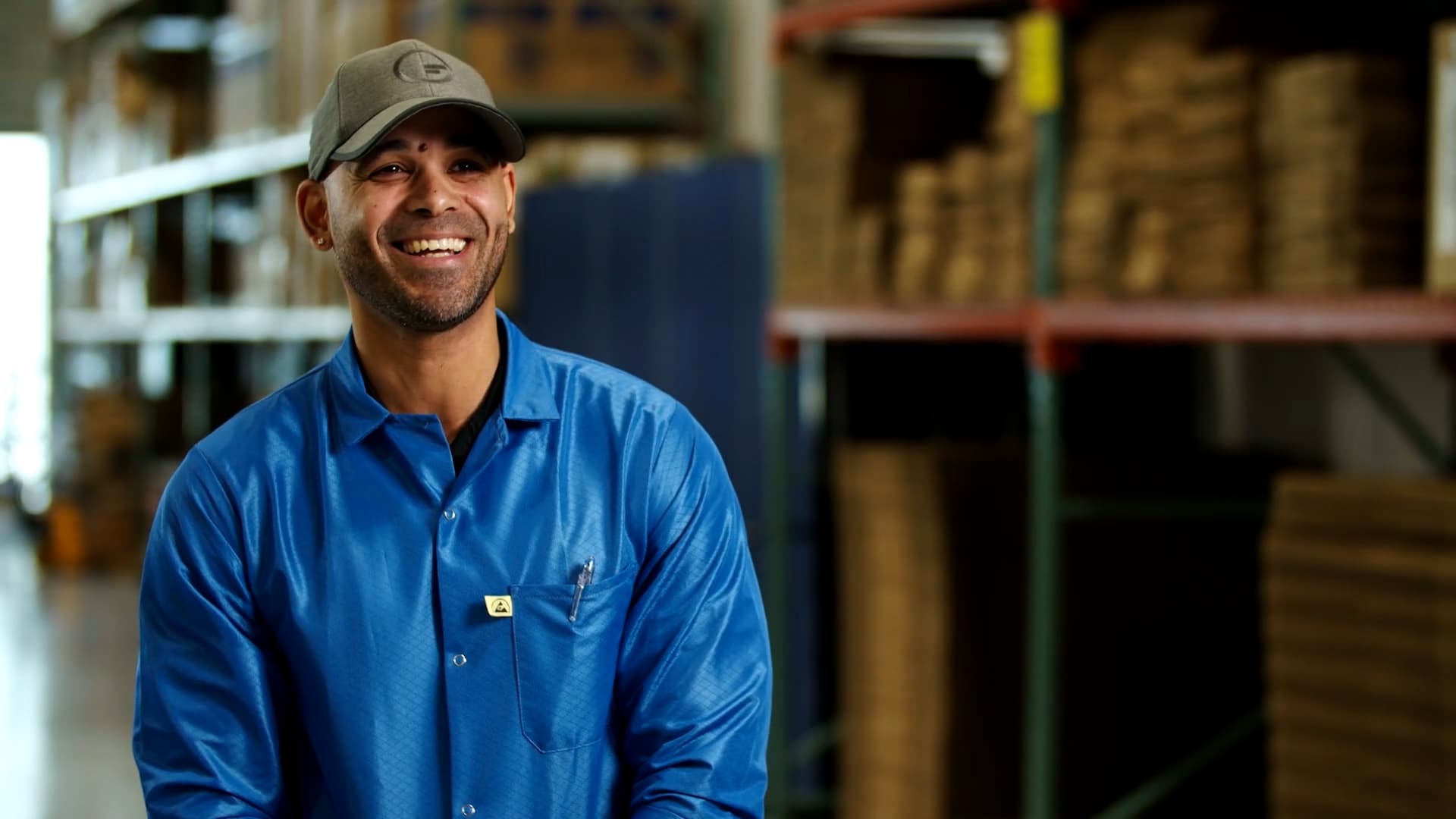 Fusion warehouse staff smiling towards camera