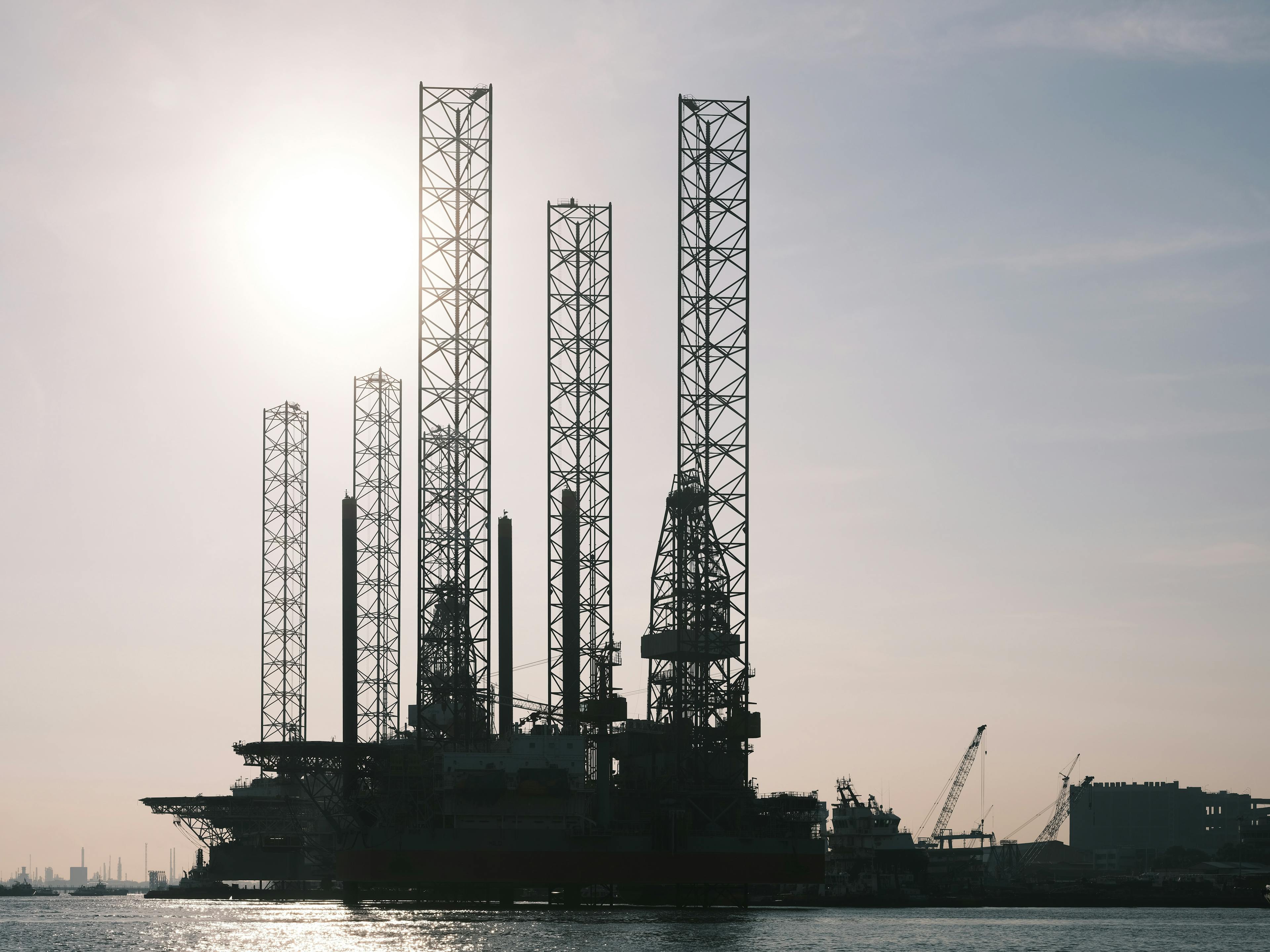 Five oil rigs stationed in the ocean